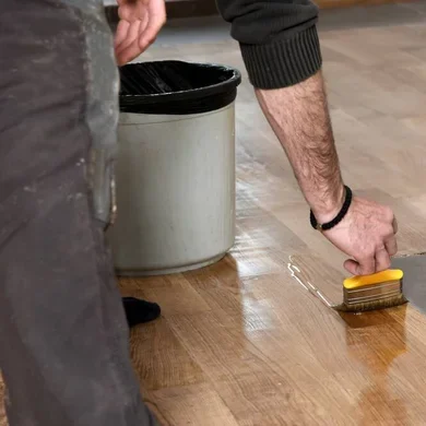 depositphotos_351078028-stock-photo-varnishing-lacquering-parquet-floor-paintbrush